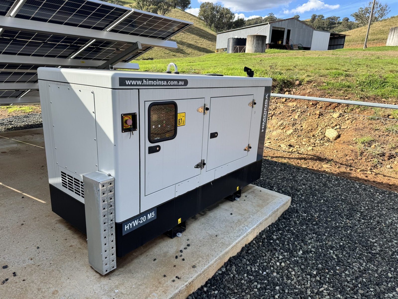 Himoinsa backup generator installed beside a ground-mount solar array on a Hunter Valley property