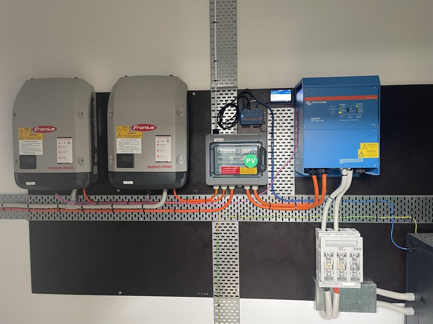 Fronius Primo inverters paired with Victron Quattro for an off-grid system